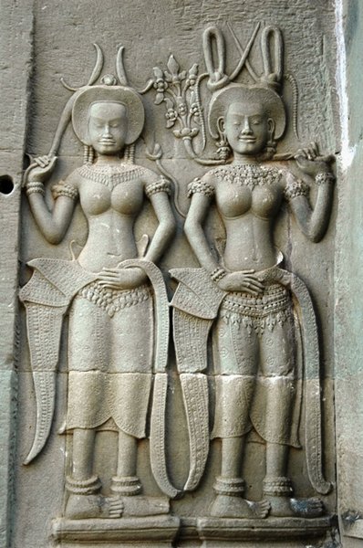 Apsara dancers carved on the temple wall