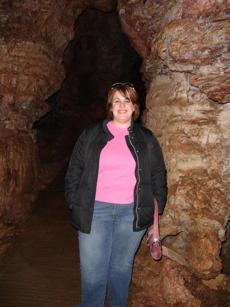 Posing in the cave, holding up the tour