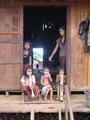 Children smoking at animist minority village