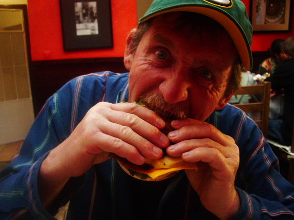 Rick eating a Burger