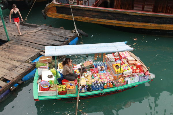 They really sell everything on those small boats... guess where all the plastic goes after !!!