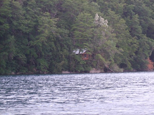 hidden wooden hut around the lake