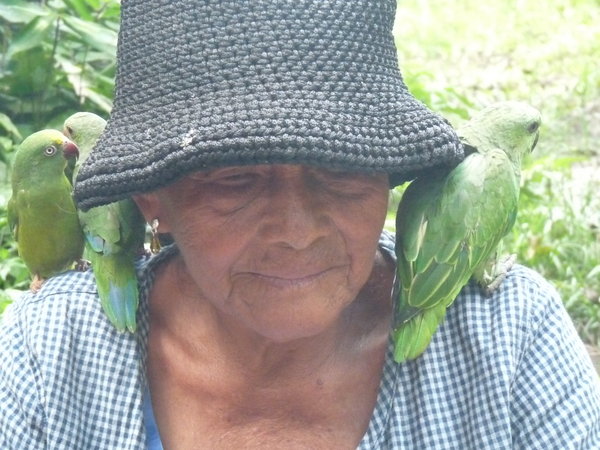 Woman with parrots