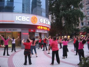 Exercise class outside the bank