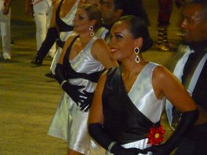 The dancers smile as they thrill the crowds