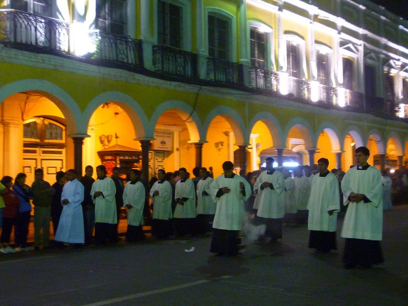 priests march in the procession