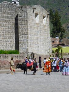 Cabanaconde central plaza and the parading of a bull and his matadore