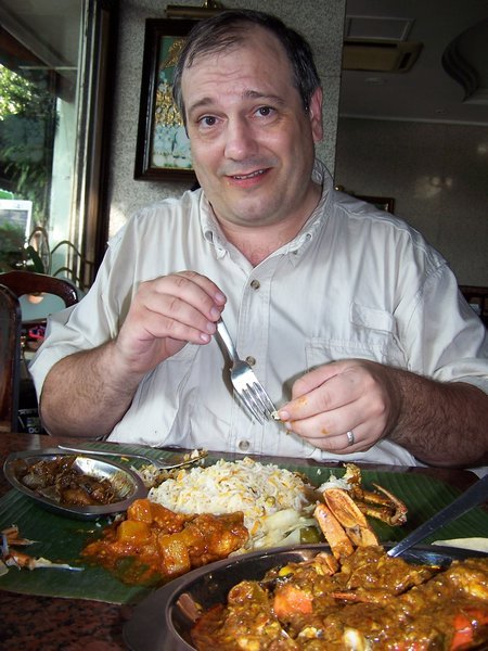 Rick eating Sri Lankan chili crab & Black sauce cuttlefish