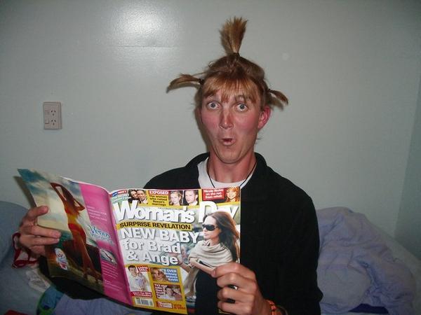 Paul reads the celeb mags while he gets his hair done