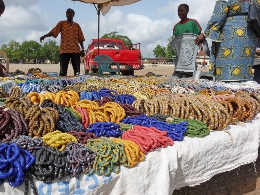 Every Thursday Koff Town hosts one of the largest bead markets in West Africa.
