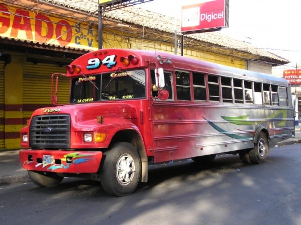 A typical bus in El Salvador. The majority of buses in Central America are refurbished school buses from the US.