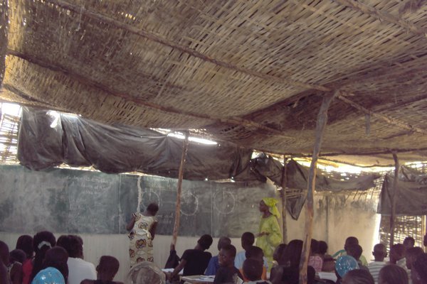 Thatched roof, wall classroom