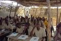 Thatched roof, wall classroom