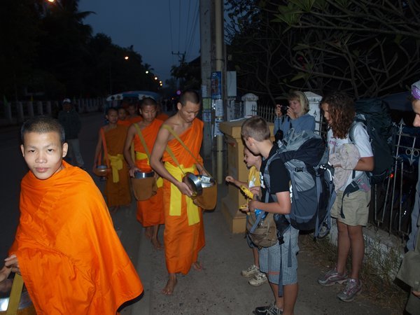 Monks at dawn Luang Prabang