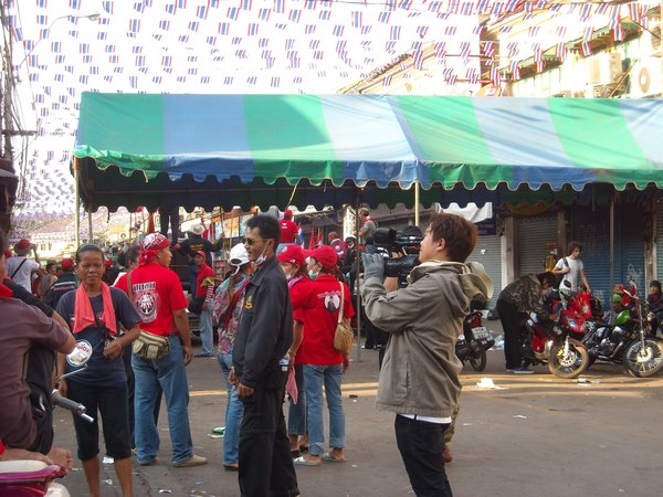 Red shirt protesters and camera crews