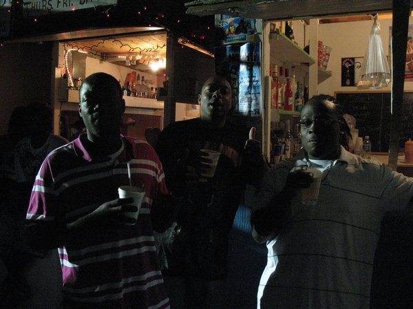 6. The boys enjoy a beer at the Regatta festivities