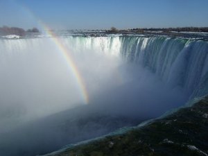 Rainbow in the mist of Niagara Falls