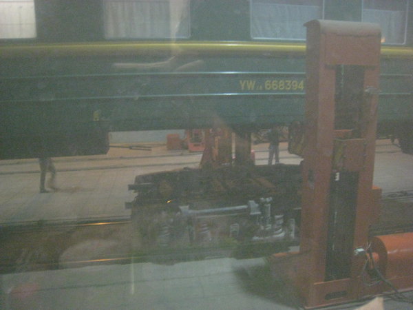 The crane lifting the train.