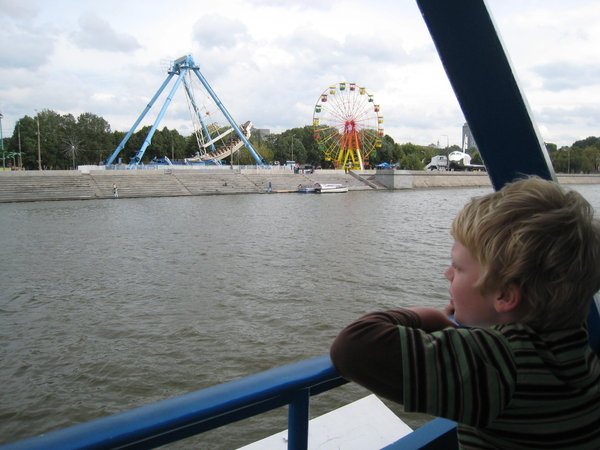 Sid looks longingly at the amusement park along the way