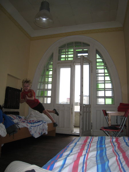 Our room in the hostel - and Sid jumping on his bed!