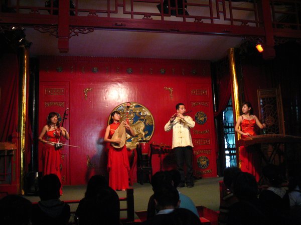 classical Chinese musicians performing in the gardens theater