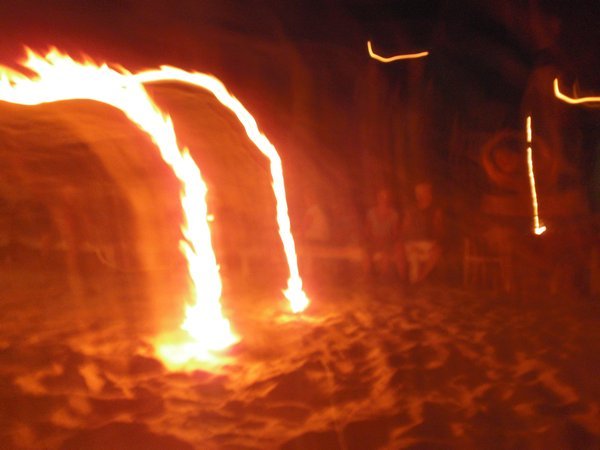 fire bowls at a band performance