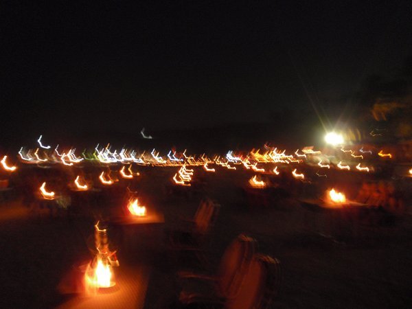 candlelit tables on the beach