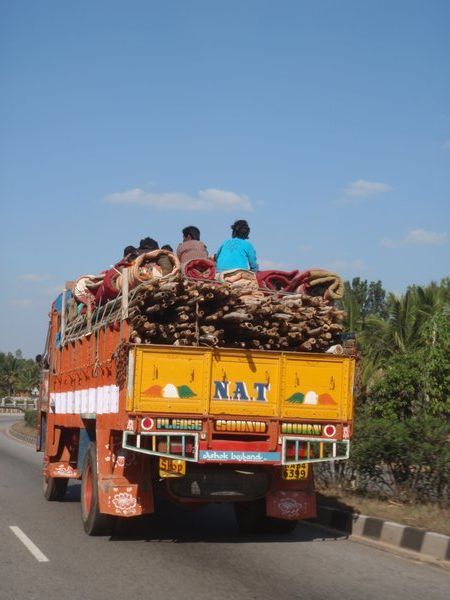 farmers catching a lift from truckers