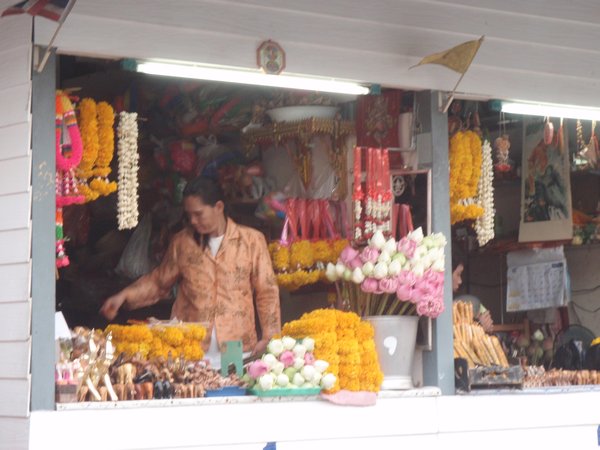 lady selling offerings
