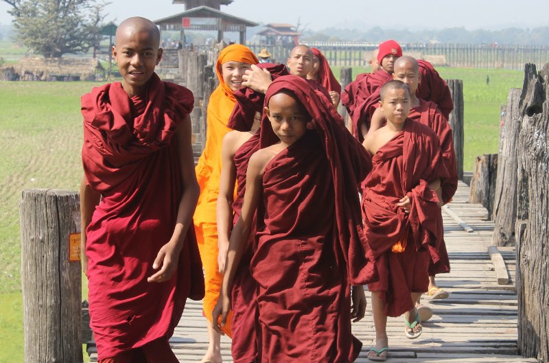 Young monks striding out