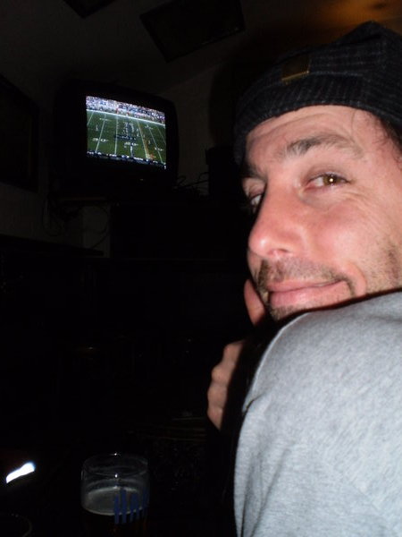 Warren watching NFL football in an Irish Pub