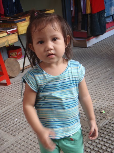 Cute little girl at markets | Photo