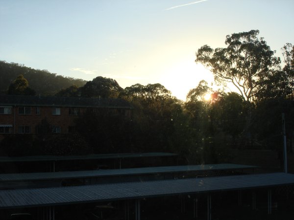 Sun sets from behind Mt Ainslie view from the corridor window my daily start of the day to feel happy
