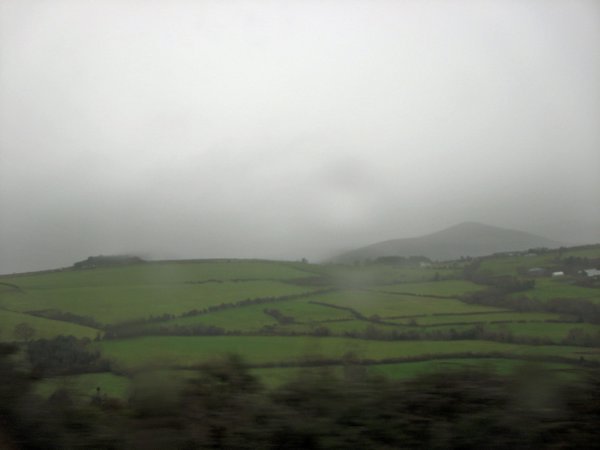 Pretty landscape on a rainy day taken from a moving bus.