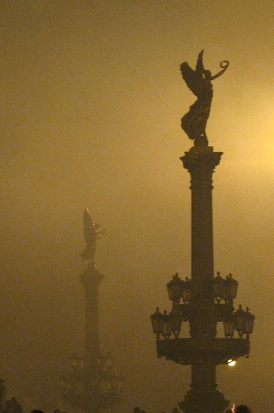 Statues and smoke/fog.