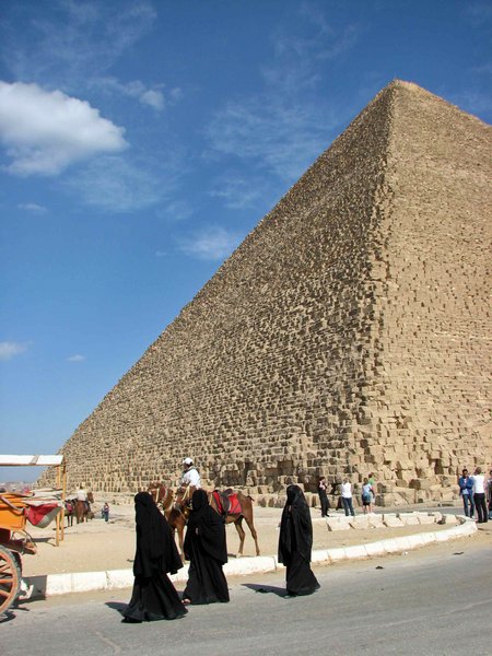 Local women and pyramids