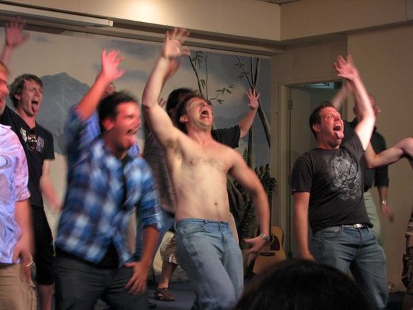 The men realllllly getting into it.  Peter scares me (shirtless one).