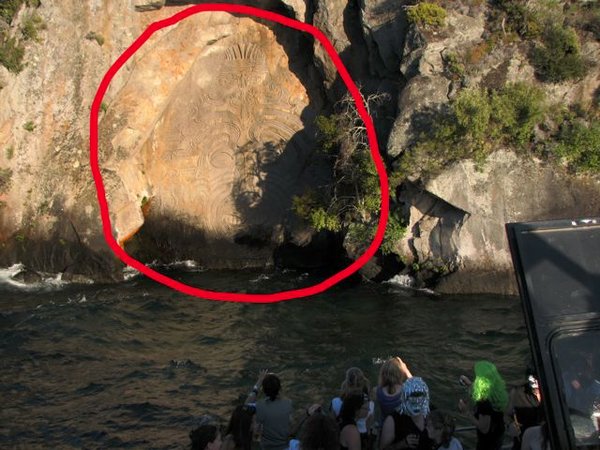 Hard to tell (hence the circle) but there were etchings on the side of the cliff.