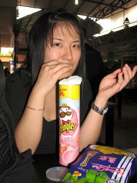 Ling enjoying Shrimp Flavored Pringles.