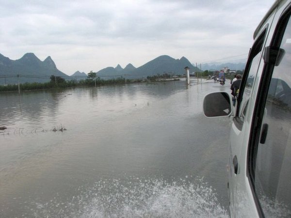 Our van going thru the flooded outskirts of Yangshuo.