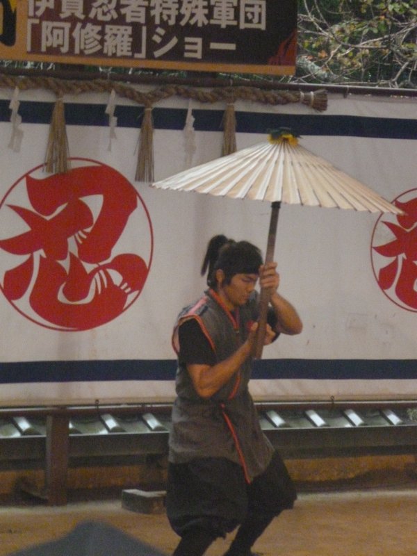 Manly ninja with fighting umbrella