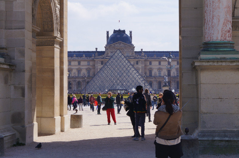 Louvre entrance through Arc de Triomphe du Carrousel 