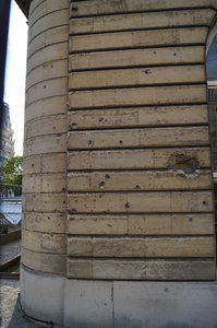 Bullet holes on a building from WW1 and WW2