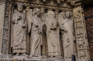 Notre Dame carvings (note John the Baptist carrying his head)