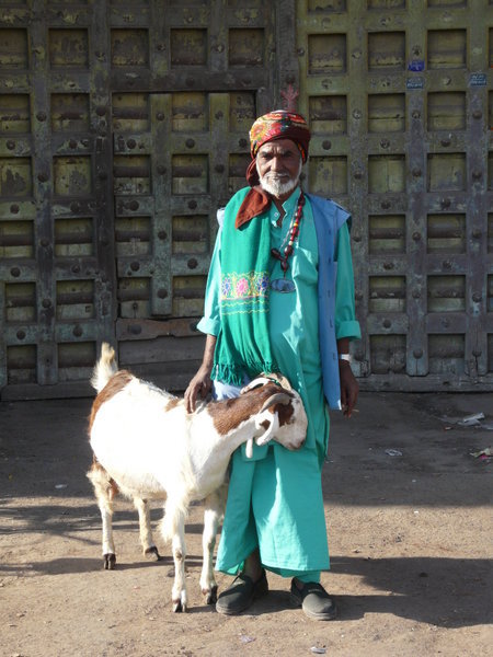 Man with goat. 