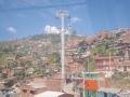 In the sky metro in Medellin view of slum below