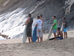 Surfers waiting to catch the next wave