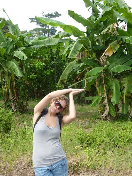 Emma blending in with the banana trees