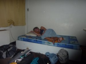 35 - Bowe hungover on a cardboard bed