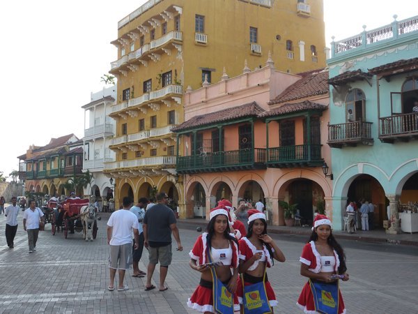 Santa's helpers in a Cartagena square